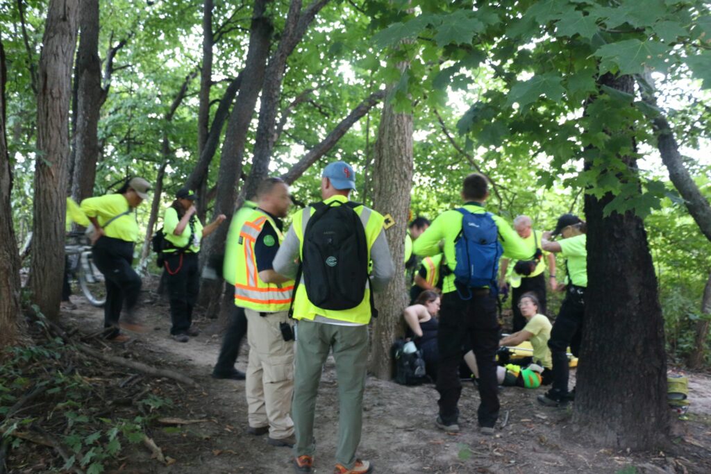 A large team assembles to assist, learn, and practice.